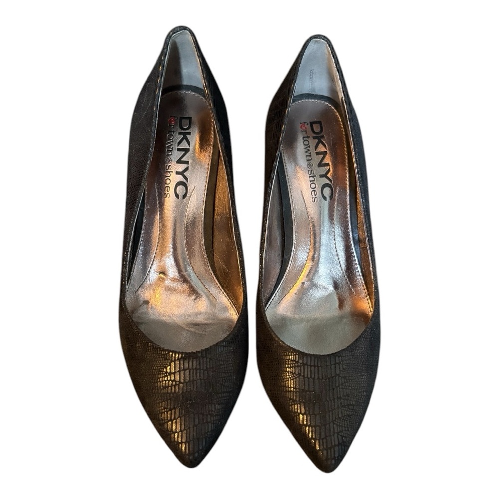 Black heels with a snakeskin like texture